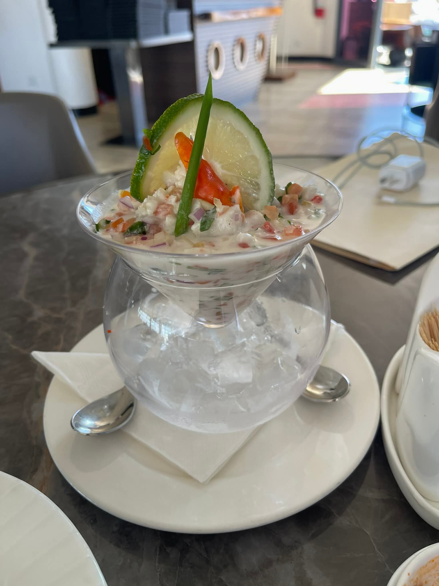 Kokoda — raw fish in coconut milk, served in a glass